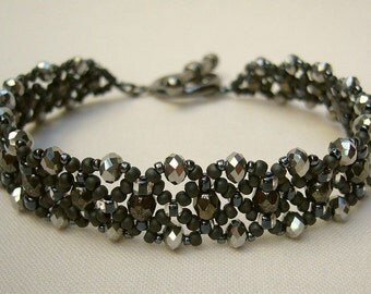 Filigree bracelet with sparkling beads in anthracite and silver