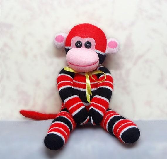 red and white striped sock monkey