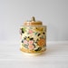 Gold Regal Crown Flower Metal Tin with Raised Pictures and Lid with Knob