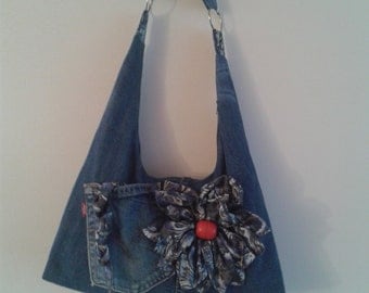 Handmade denim shoulder bag with flower