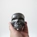 Human Skull ceramic halloween decoration in a stunning black metallic glaze for display