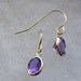 8x6mm Purple to Blue Color-Change Zandrites in 10k Yellow Gold Dangle Earrings