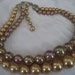 VINTAGE Graduated Double Strand Iridescent & gold Bead Costume Jewelry Necklace