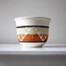vintage. handmade. pottery. vase. planter. geometric aztec style. earthenware.