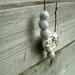 Felted beach stone necklace Grey White