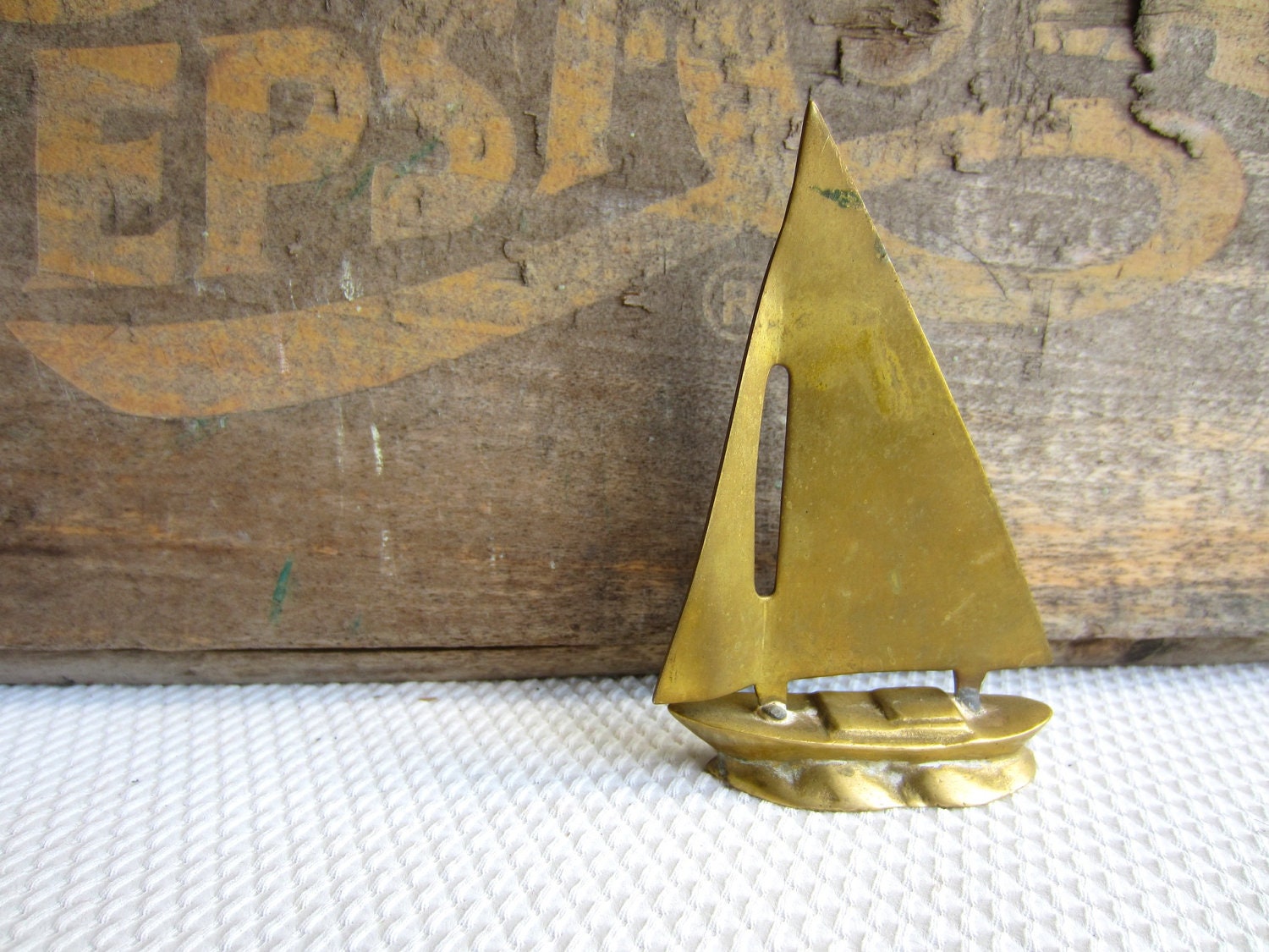 small brass sailboat