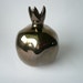 The magic reflective Pomegranate reveals no lies, vase metallic brown desk top office decor
