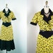 1950s Dress - Vintage 50s Atomic Leopard Novelty Print Yellow Black Cotton Fishtail Party Dress L - Bad Kitty