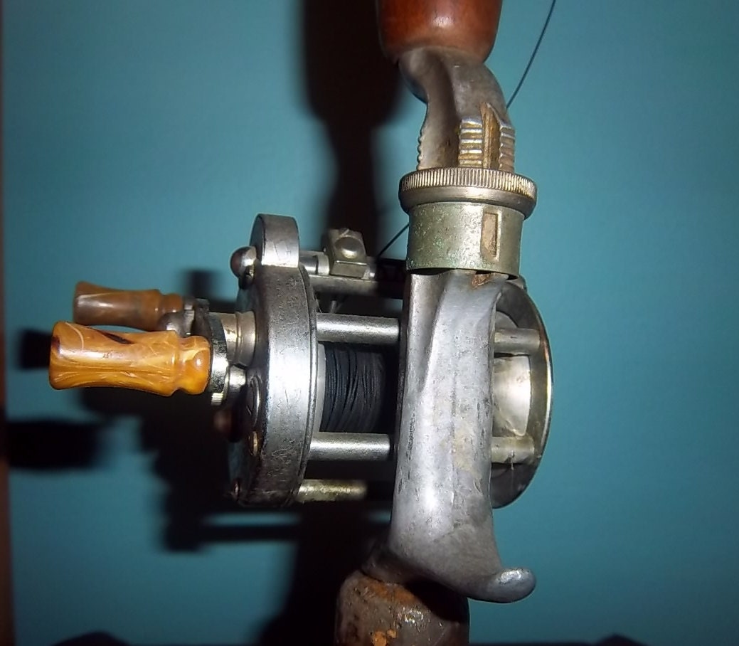 Vintage Pflueger 1953 Bait Caster on Metal Rod Fishing Pole