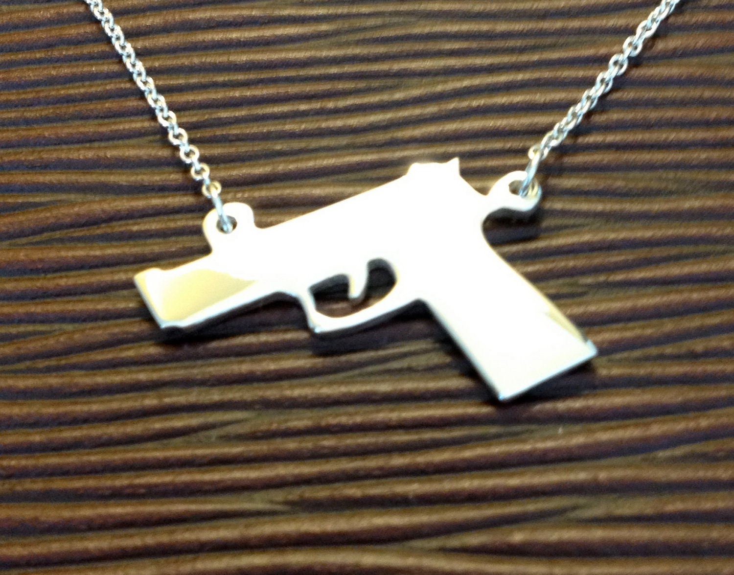 The Gold Gun Necklace