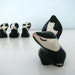 vintage Family of Skunks - mama and three baby stinkers