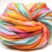 Super bulky handspun rainbow yarn, spun thick and thin in merino wool- 75 yards, 2.65 ounces/ 75 grams