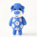 Deep blue pocket bear with daisies 50