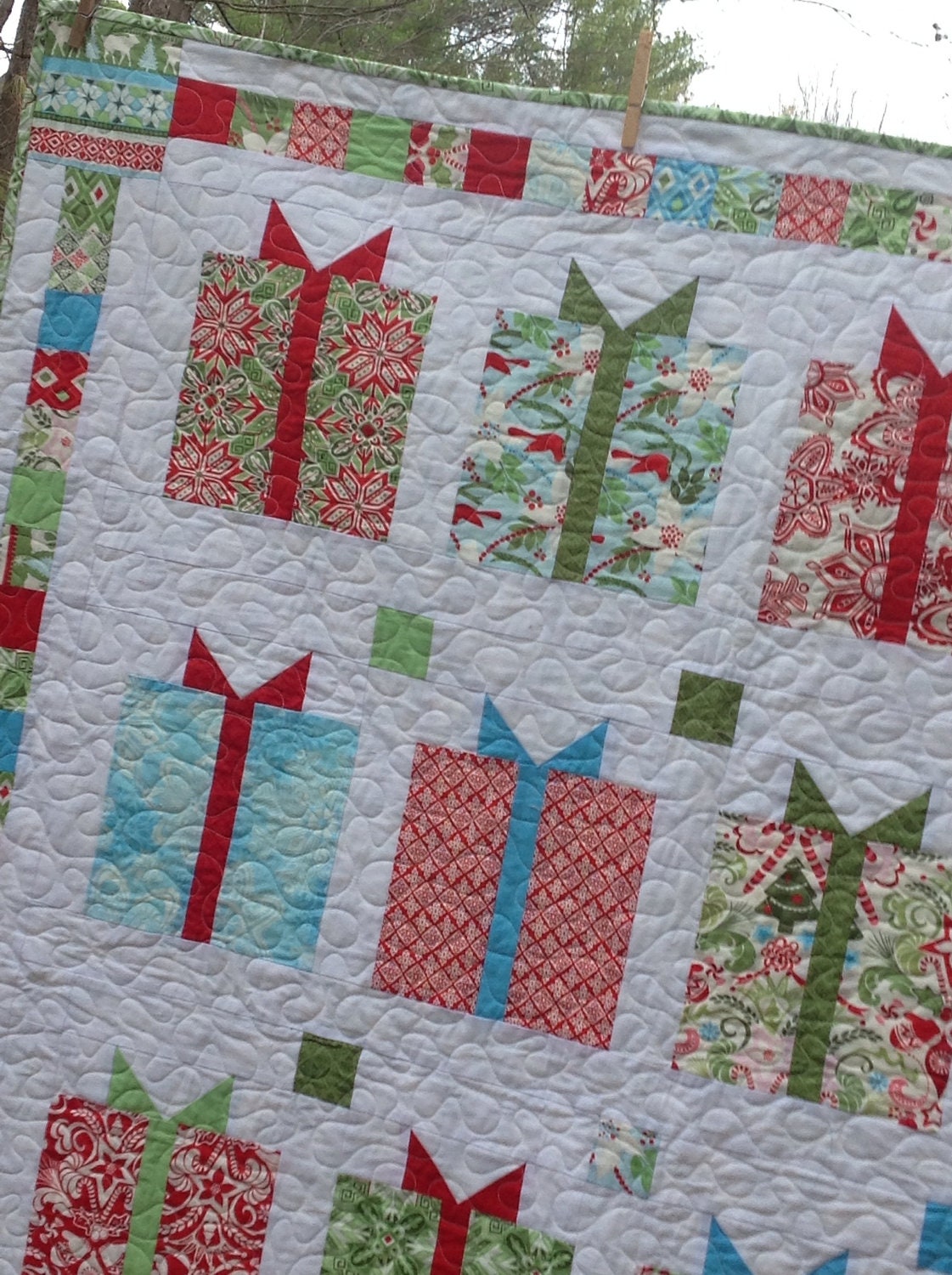 Flurry Christmas Presents Lap Quilt red blue green