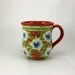 Red handmade and painted porcelain coffee cup