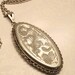 Vintage silver locket. Large. Oval shape. On silver chain