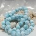 Larimar AA beads, nice ice blue 9 mm gems - 257.0 ct