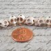 NEW SIZE Teeny Tiny Cream Colored Stone Skull Beads