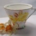 Vintage Tea Cup Yellow Flowers Hand Painted by Phoenix China England