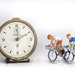 French vintage alarm clock JAZ, creamy and gold