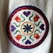 Pa Dutch Hex Sign embroidered on kitchen towel