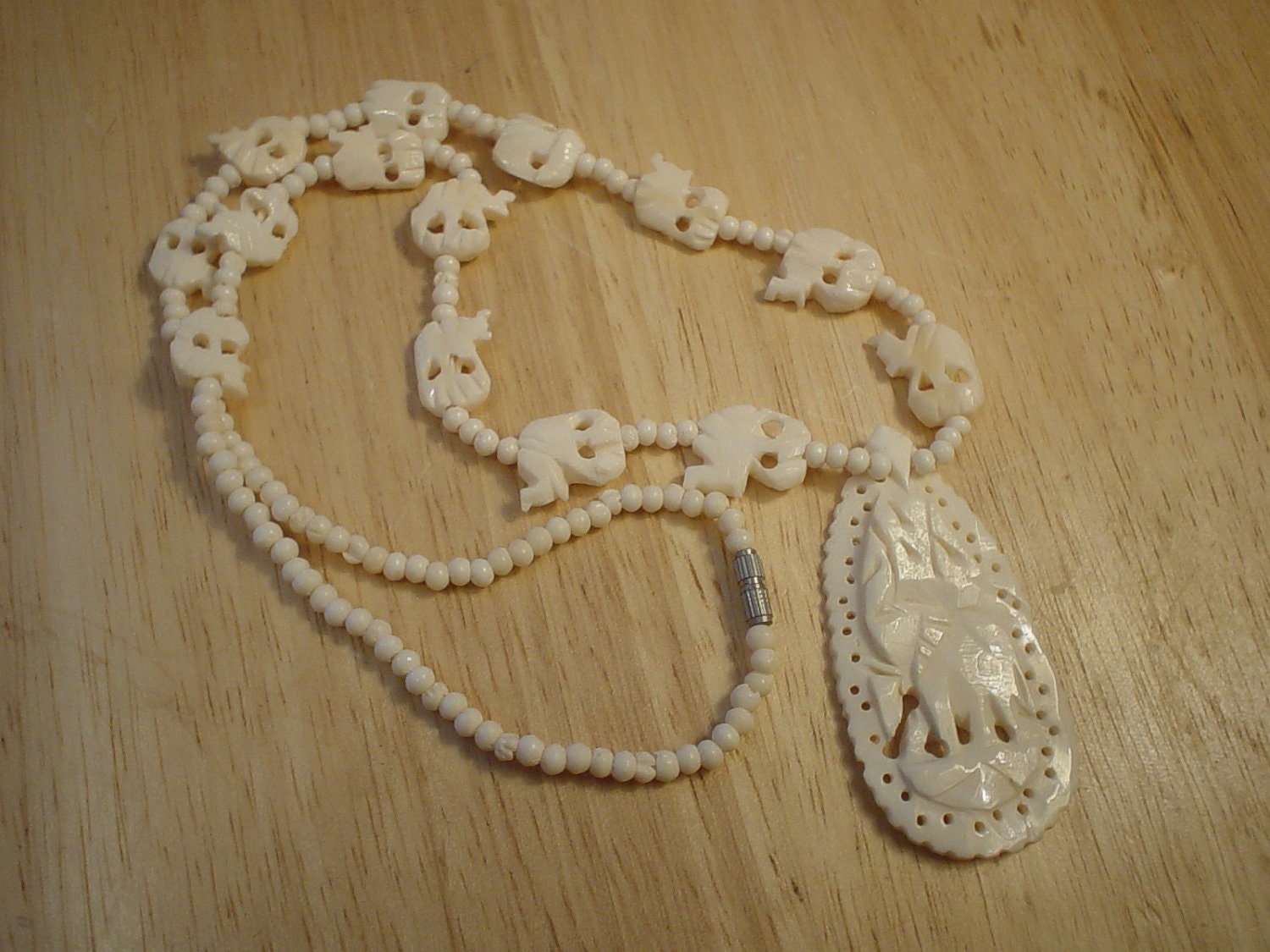 Vintage Faux Ivory Carved Elephant Necklace