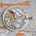 1 inch Vintage watch movement with dial.