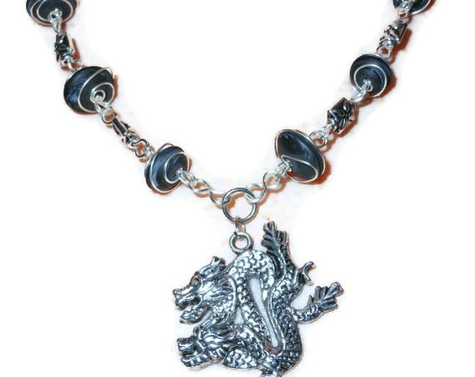 Wire wrapped dragon necklace Tibetan silver handmade with frosted glass beads.