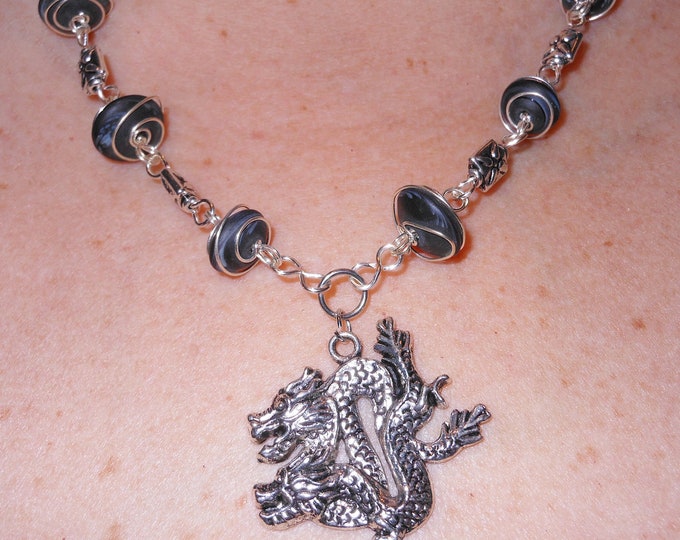 Wire wrapped dragon necklace Tibetan silver handmade with frosted glass beads.