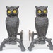 Vintage Cast Iron Owl Andirons with Amber Yellow Glass Eyes that Glow with a Fire