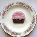 light pink no-calorie frosted cupcake pin with multicolored pastel bead sprinkles