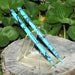 Hairsticks turquoise green and black pin striping .200.