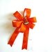 Bright orange mini bow with birthday party hat (SB30)
