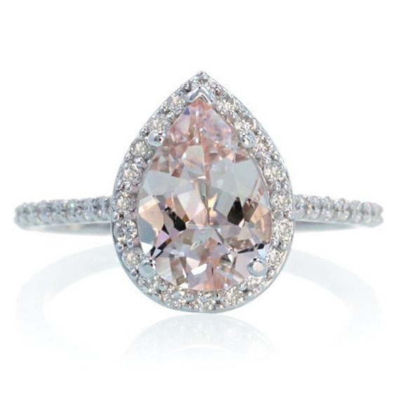 Pear cut halo engagement rings uk