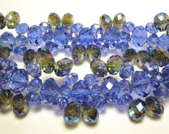 Crystal bracelet 6mm and 3mm blue crystals with gray blue 5mm crystals with an AB finish on a stretchy cord