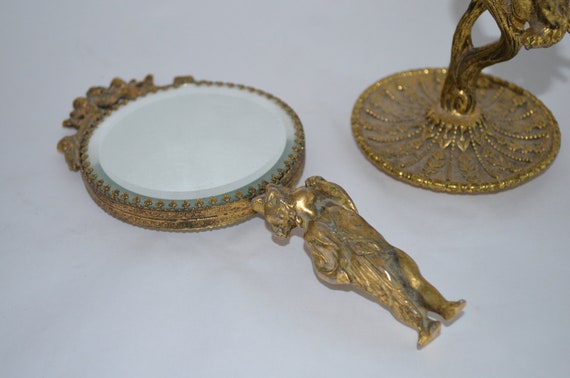 vintage gold hand mirror