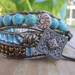 Turquoise and Green Leather Wrap with Bronze Button and Metalic Leather