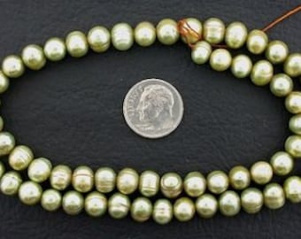 16 inch strand large light green freshwater pearls