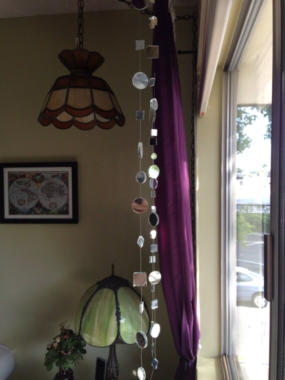 Items similar to Hanging mirrors on string on Etsy