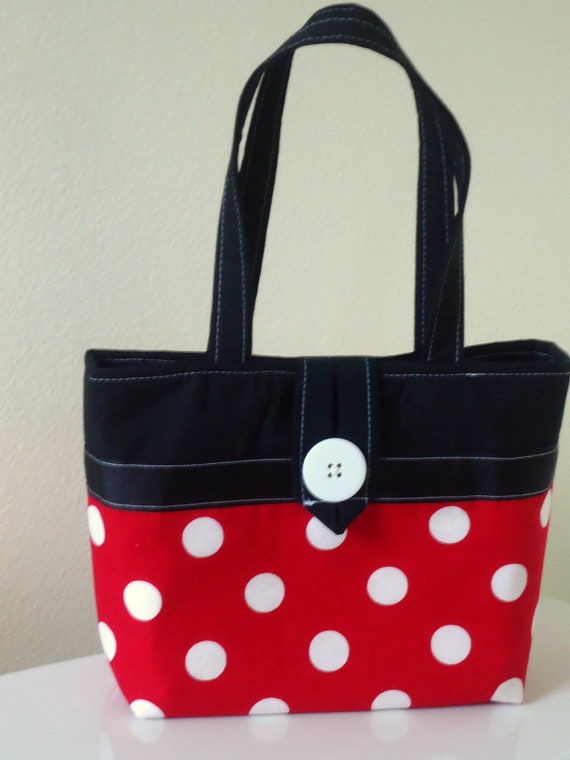 red polka dot purse