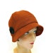 Cloche Hat in Rust Wool with Carved Horn Button