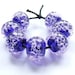 Handmade lampwork bead set of 7 purple and pink glass bubble beads