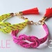 SALE Neon pink knot rope bracelet with tassel charm