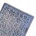 Apple Blossoms - Handmade Tile with embossed design glazed in slate blue matte for home decor.
