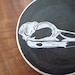 Stoneware Raven skull Trivet