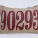 Burlap Charley Pillow - put your custom zip code here