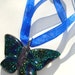 colorful glass butterfly pendant on blue organza ribbon necklace
