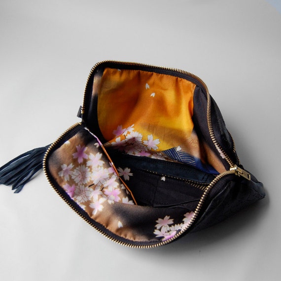 leather clutch in black floral