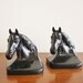 Pair of vintage cast metal horse head bookends