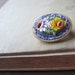 blue yellow and red micromosaic floral pin brooch from italy